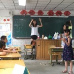 students in classroom with teachers Melody Liang and Zitong Li