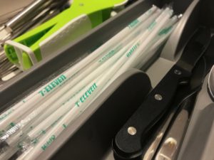 plastic straws from 7-Eleven sit in a drawer