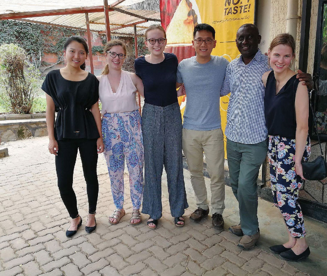 Kirstyn Koswin, and a group of student researchers in Rwanda.