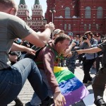 An image of a Russian nationalist kicking a gay rights activist