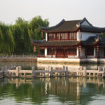 Traditional chinese home on the water and trees