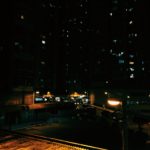 Street light and dark buildings at night