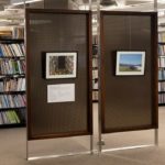 Framed photographs on display at the Richard Charles Lee Canada Hong Kong Library