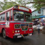 A public bus speeds through the working class district of Pettah, Colombo.