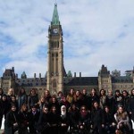 Shot of the Women in House participants in front of the Canadian Parliament