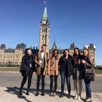 Munk One students standing in front of the Parliament Hill