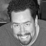 Headshot of Matthew Hoffman in Black and White