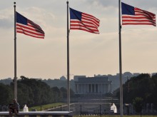 Photo of three flags and Lincoln Monument by Roger Schultz