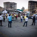 Picture of people protesting in Syrian city of Ar-Raqqah, courtesy of Beshr O: https://www.flickr.com/photos/beshro/8647270729