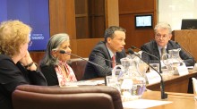 From left to right, Naomi Alboim, Ratna Omidvar, Randall Hansen and Brian Stewart sit at a panel in a conference room.