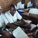 Students in class at a high school in Uganda