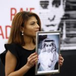 Ensaf Haidar, wife of the jailed Saudi Arabian blogger Raif Badawi, shows a portrait of her husband as he is awarded the Sakharov Prize, in Strasbourg, France.