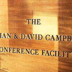 A plaque that reads The Vivian and David Campbell Conference Facility