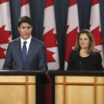 Justin Trudeau and Chrystia Freeland speaking at a press conference to announce new trade deal