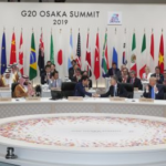 Leaders from G20 countries sitting together in two rows