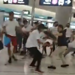 Blurry photo of a group of men fighting