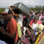 A group of Venezuelan migrants travelling on foot