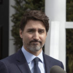 Justin Trudeau gives an update on COVID-19 at a press conference outside of his residence