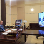 Russian President Vladimir Putin chairs a videoconference meeting at the Novo-Ogaryovo state residence outside Moscow