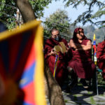 Tibetans living in exile attend an event to mark Tibetan Uprising Day
