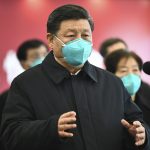 Xi Jinping gives a speech while wearing a medical mask