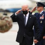 Joe and Jill Biden saluting U.S. military personnel