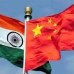 India and China flags fly side by side