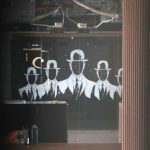 Mural of silhouettes of men