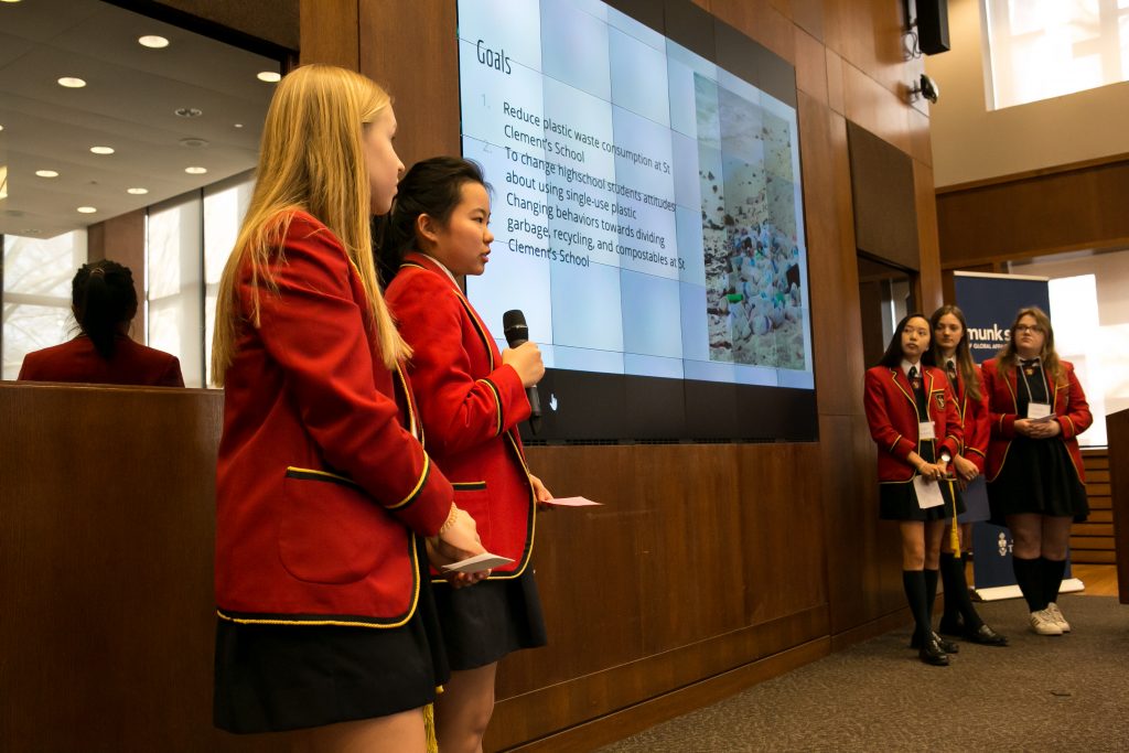 High school students presenting a slide show
