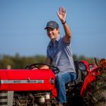 Justin Trudeau driving a tractor