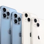 iPhone 13s standing side-by-side in blue and white