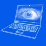 Image of an eye in the centre of a laptop screen