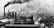 Image of industrialized cities, with smoke stacks