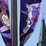 Queen Elizabeth II on a banner with Canadian parliament in the backrground
