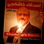 A demonstrator holds a poster with a picture of journalist Jamal Khashoggi outside the Saudi Arabia consulate in Istanbul, 2018. Photograph: Osman Örsal/Reuters